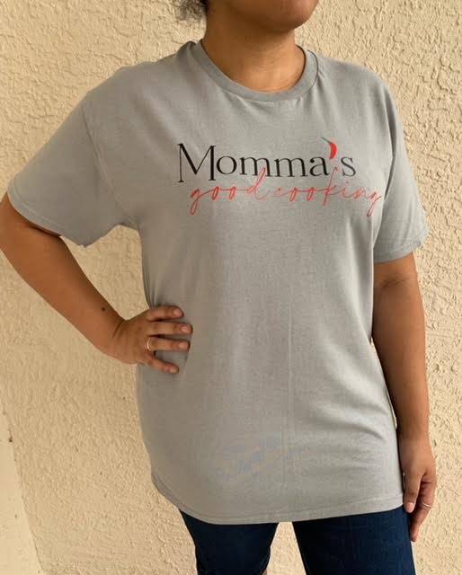 Momma's Good Cooking Short Sleeve T-shirt (Unisex): Modeled by a Woman